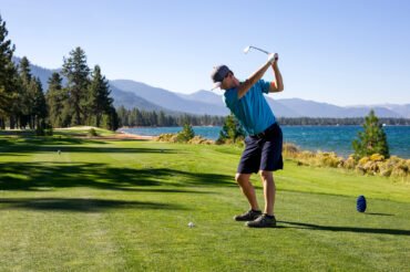 A man teeing off at Edgewood Tahoe in Stateline, Nevada.
